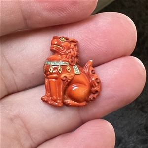 Arita button of a realistic foo dog (lion).