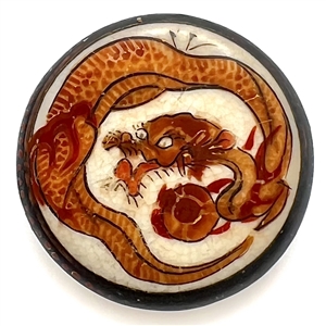 Older satsuma button of a  unique gold dragon.