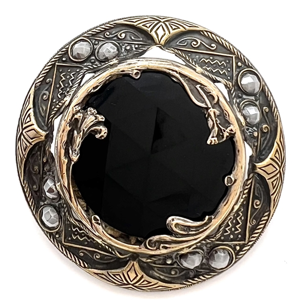 Gorgeous true Gay 90s button with faceted black glass center, cut-steels and inner border of flowers. 
