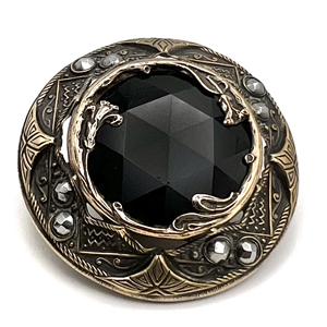 Gorgeous true Gay 90's button with faceted black glass center, cut-steels and inner border of flowers. 