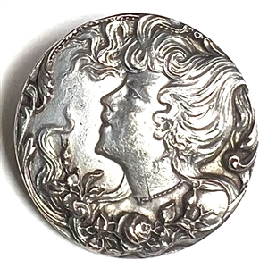 Silver plated brass button of an Art Nouveau woman.