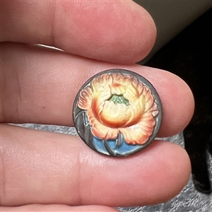 Arita porcelain button of a peony.